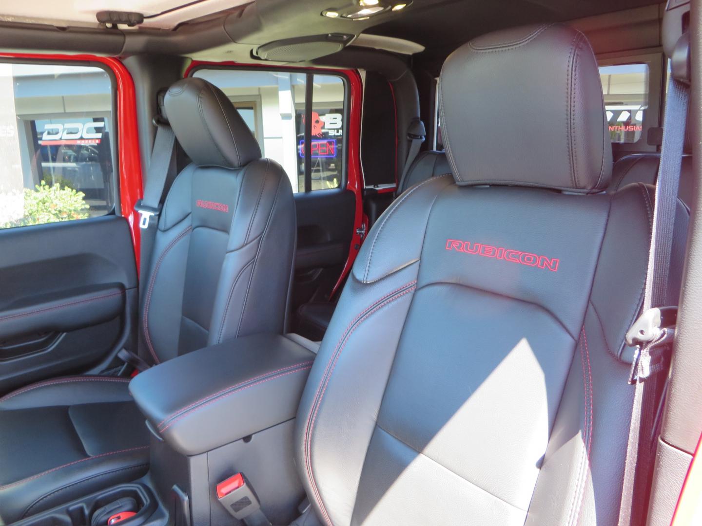 2020 Red /black Jeep Gladiator Rubicon (1C6JJTBG6LL) with an 3.6L V6 DOHC 24V engine, 6M transmission, located at 2630 Grass Valley Highway, Auburn, CA, 95603, (530) 508-5100, 38.937893, -121.095482 - Rubicon Gladiator featuring a Mopar suspension system with Fox shocks, 17" AEV wheels wrapped in 37" BFG tires, Warn Winch, Rock sliders, Cascade front license plate holder, Impact bedliner, Built Right Industries bed Molle panels, and Window tint. - Photo#20